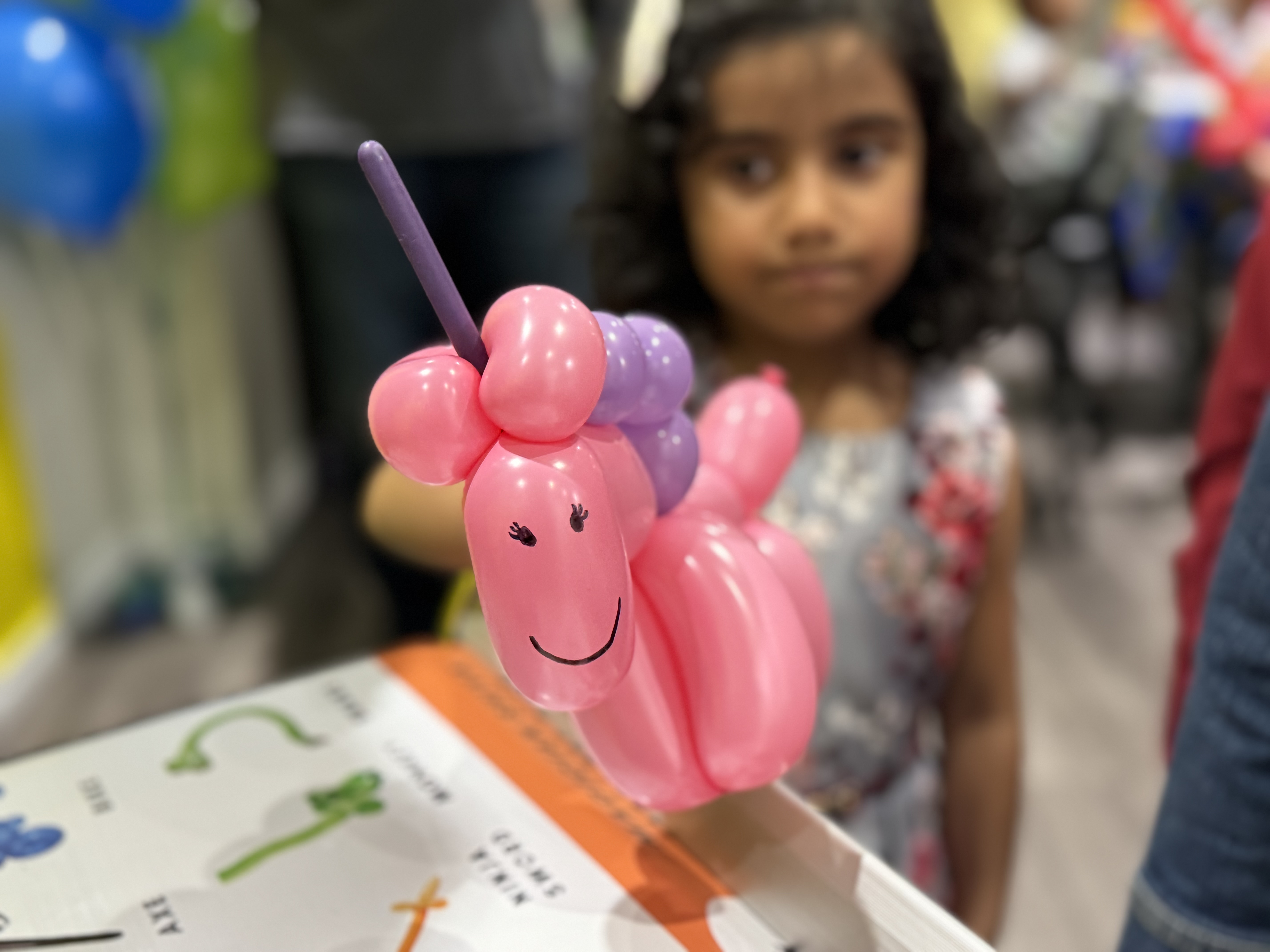 Kids with balloon creations